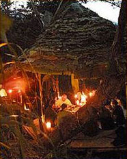 Bamboo torches enchant the evening dinner